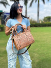 HAND TOOLED LEATHER BAGS